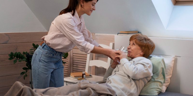 female-nurse-taking-care-elderly-person (1)