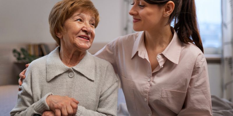 female-nurse-taking-care-elderly-person